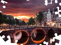 Domy, Amsterdam, KanaĹ Leidsegracht, ZachĂłd sĹoĹca, Most, Holandia, Rzeka, Chmury, ĹwiatĹa, Drzewa