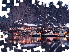 Lofoty, Norwegia, Morze, GĂłry, OĹwietlone, Odbicie, Zima, Domy, SkaĹy